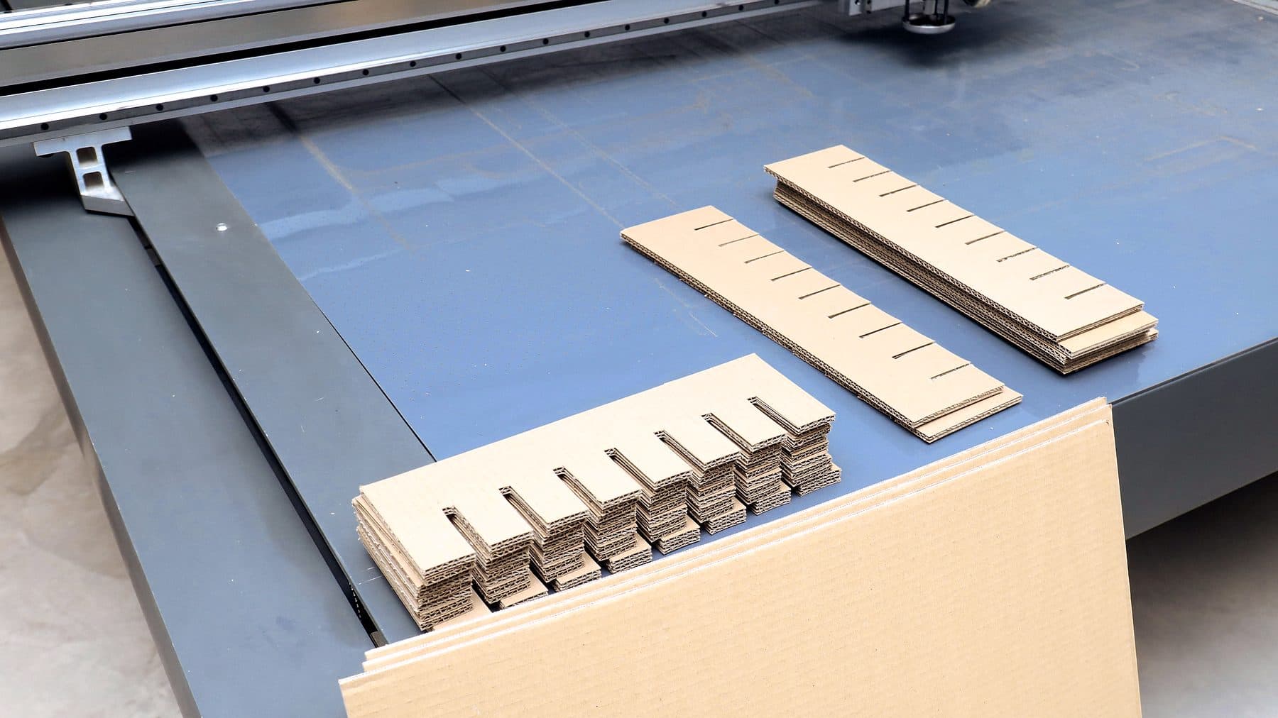CNC cutting table with typeset samples